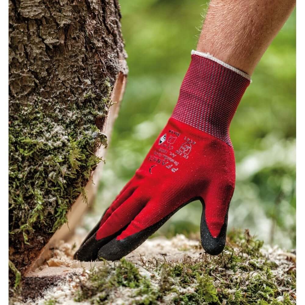 Pfanner work gloves worn in a forest setting