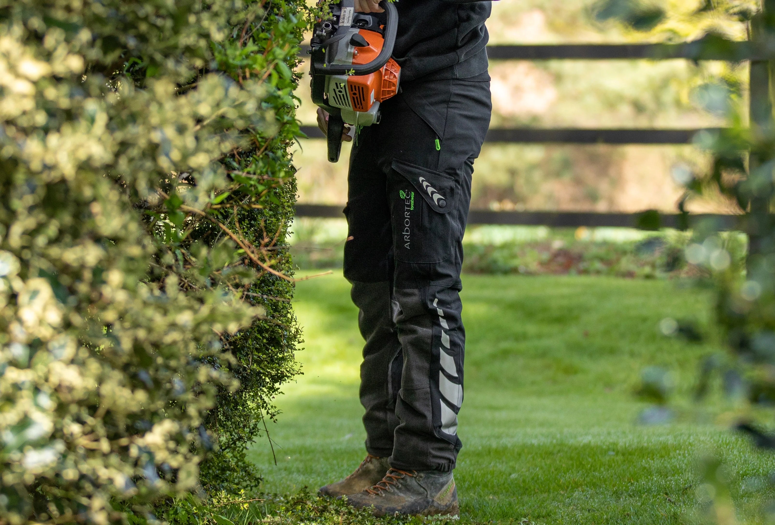 Chainsaw Trousers worn by a tree surgeon